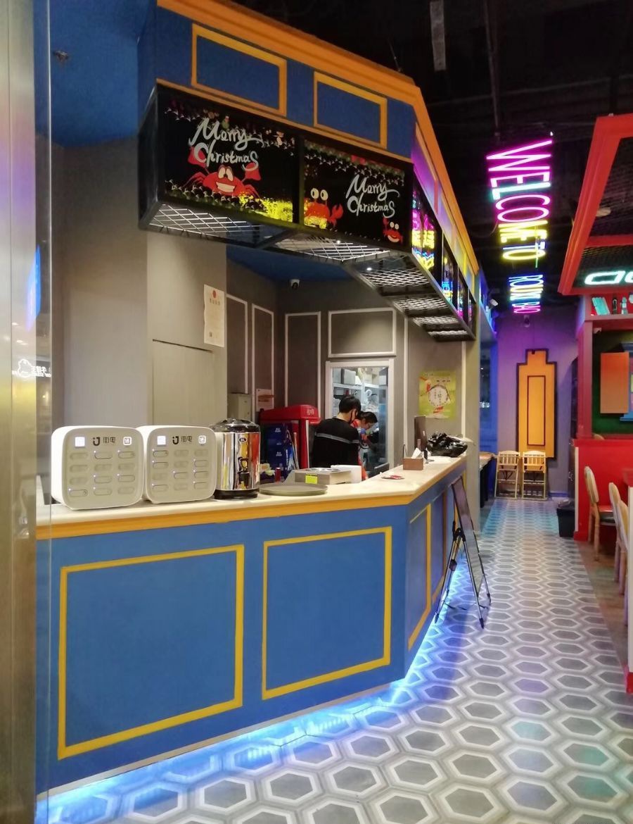 青岛多嘴肉蟹煲装修效果图